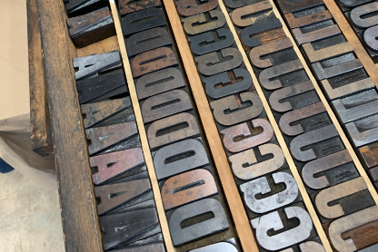 image of wood case filled with type