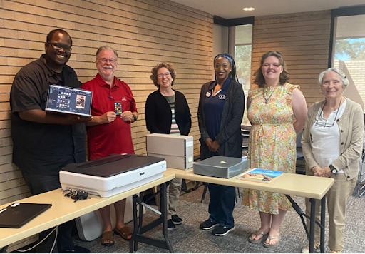 Jerrell Jones with librarians and archivists from the Archives of Galveston County.