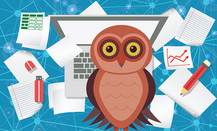 Owl surrounded by research materials (computer, graphs, notes)